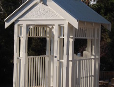wooden_gate_house_corrugated_roof
